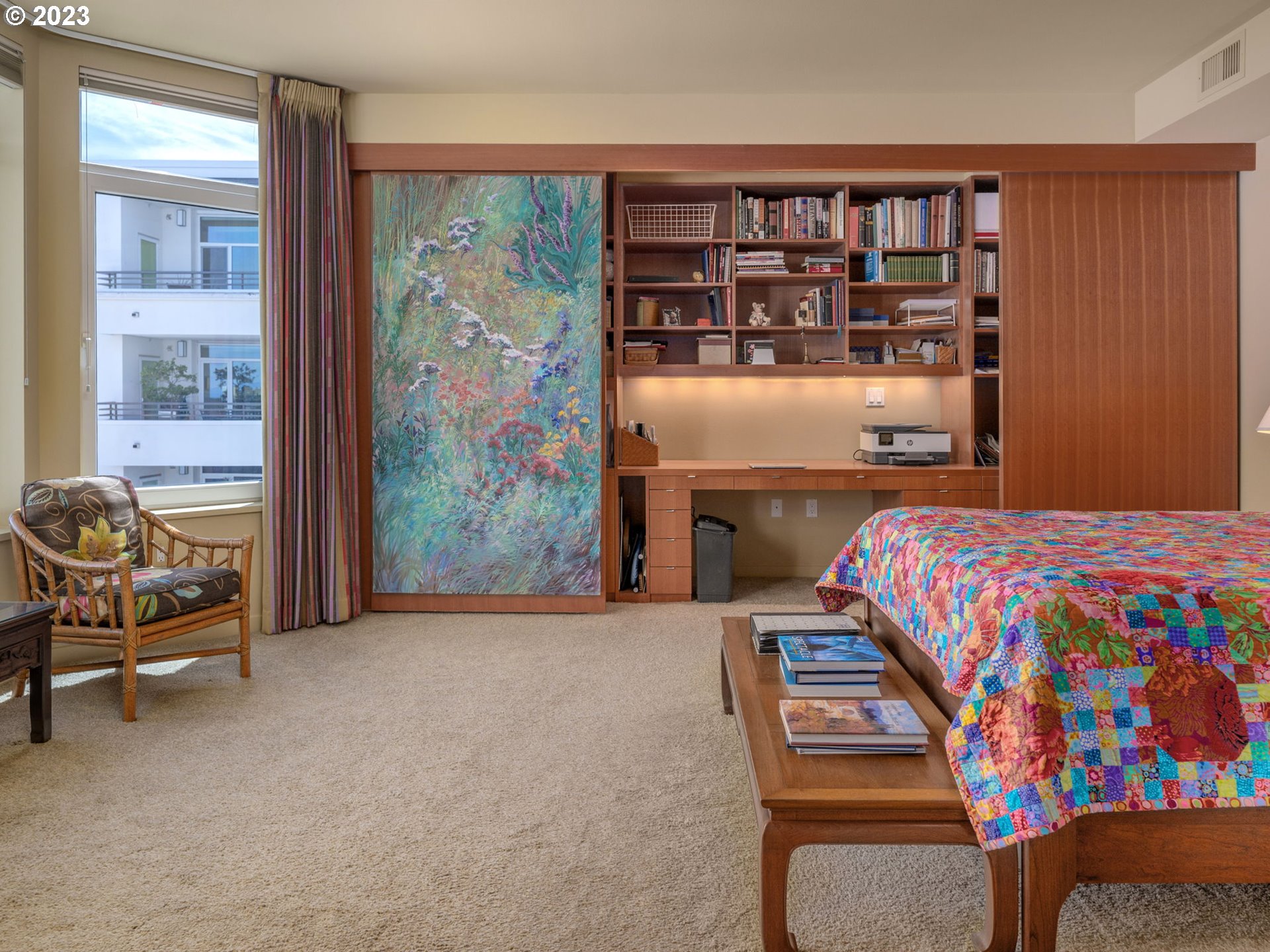 2445 Northwest Westover Road, Unit 411 Portland, OR 97210 - Photo 26 of 38 a bedroom with a bed and a window