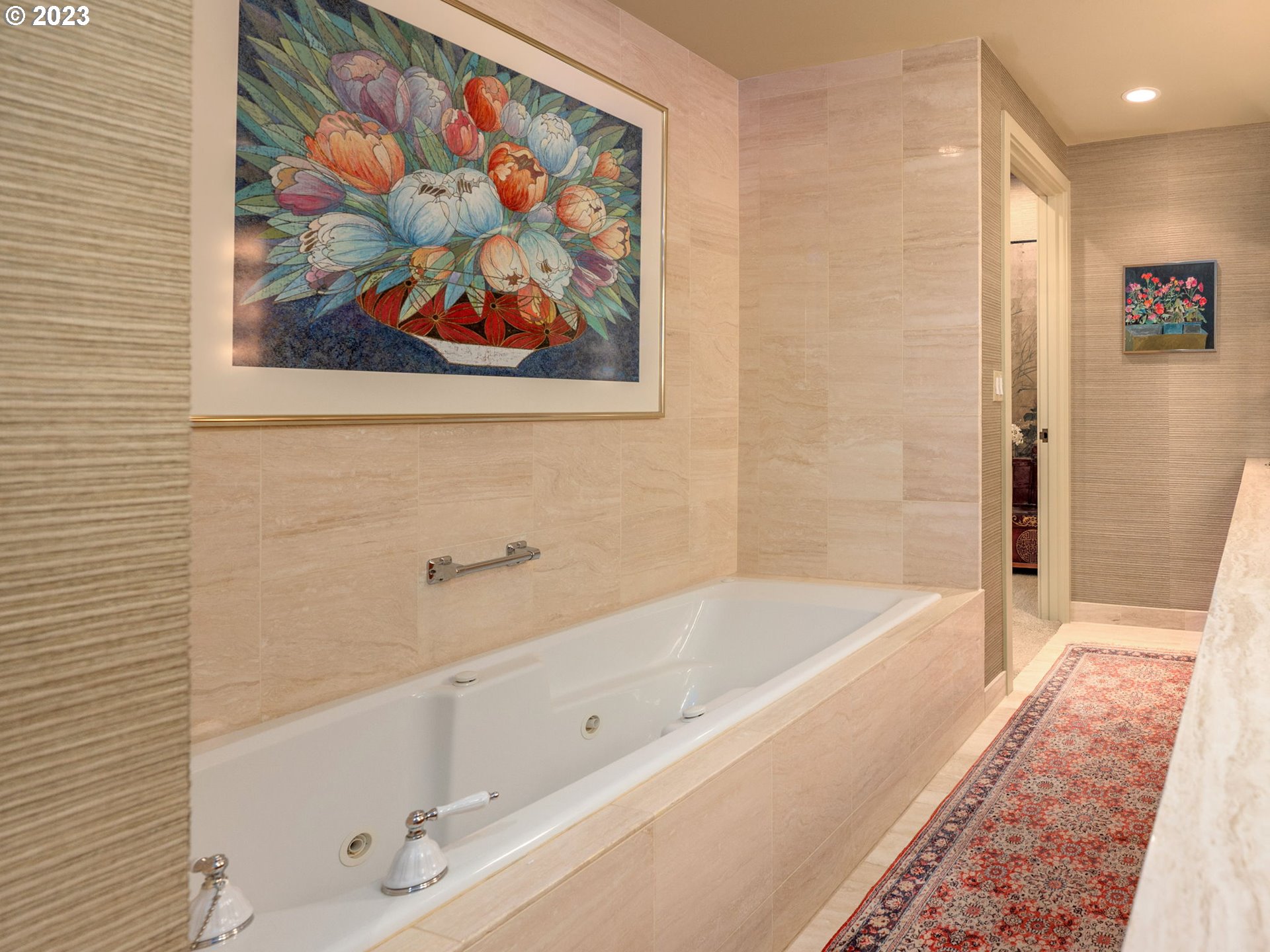 2445 Northwest Westover Road, Unit 411 Portland, OR 97210 - Photo 28 of 38 a bathroom with a bathtub and a shower