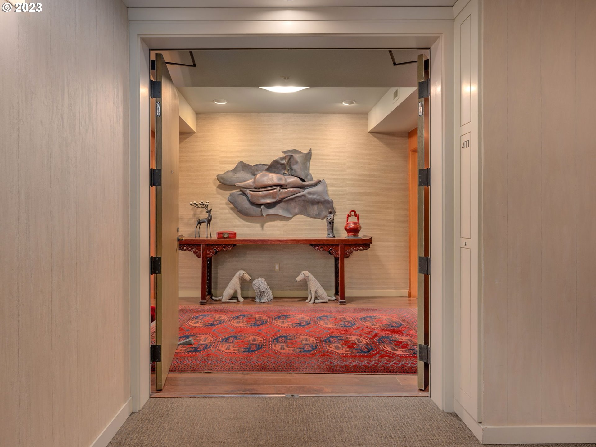 2445 Northwest Westover Road, Unit 411 Portland, OR 97210 - Photo 3 of 38 a room with storage and utility