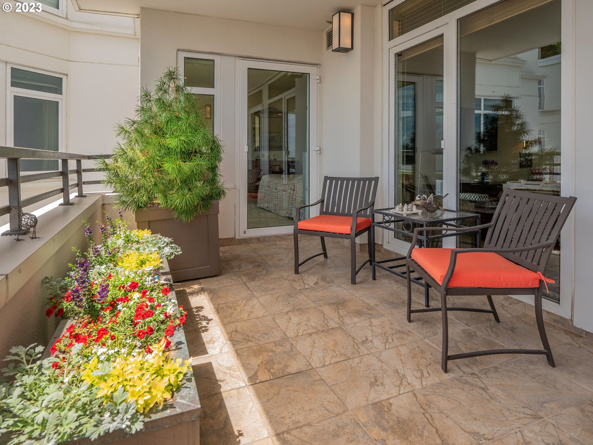 2445 Northwest Westover Road, Unit 411 Portland, OR 97210 - Photo 31 of 38 a outdoor space with tables and chairs