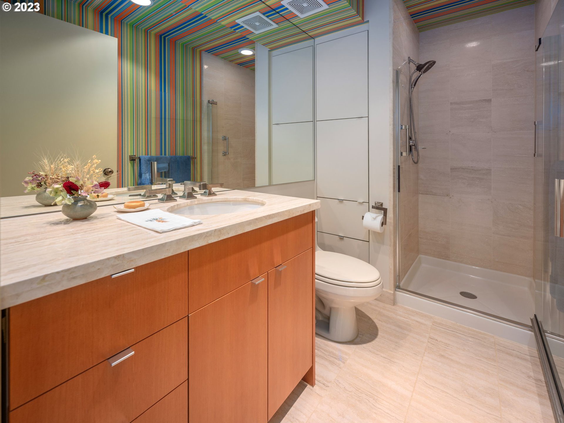 2445 Northwest Westover Road, Unit 411 Portland, OR 97210 - Photo 32 of 38 a bathroom with a sink toilet and shower
