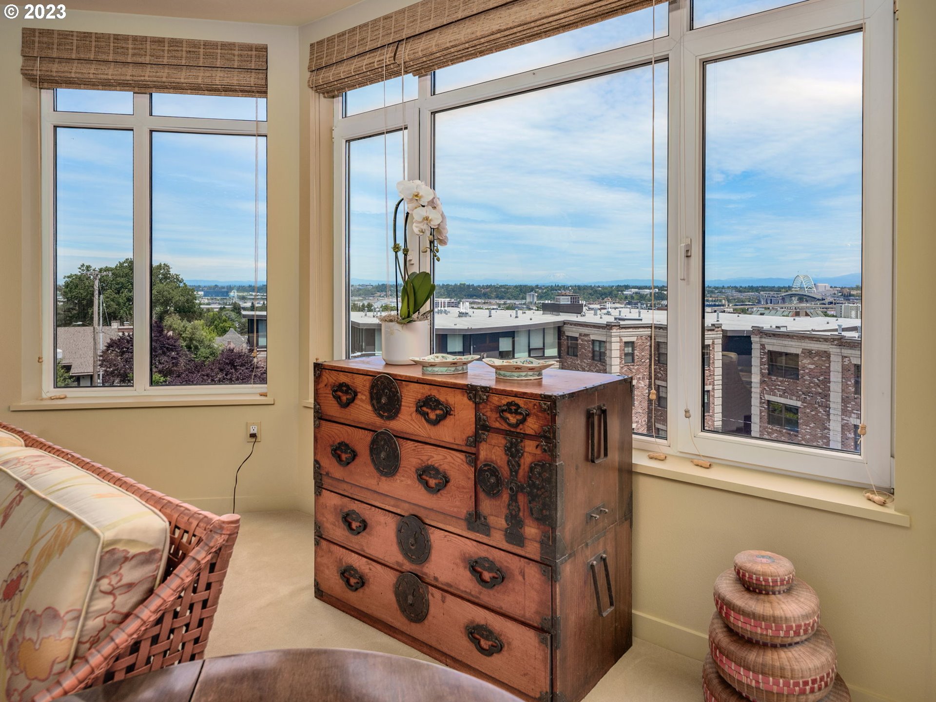 2445 Northwest Westover Road, Unit 411 Portland, OR 97210 - Photo 7 of 38 a view of a living room and a balcony