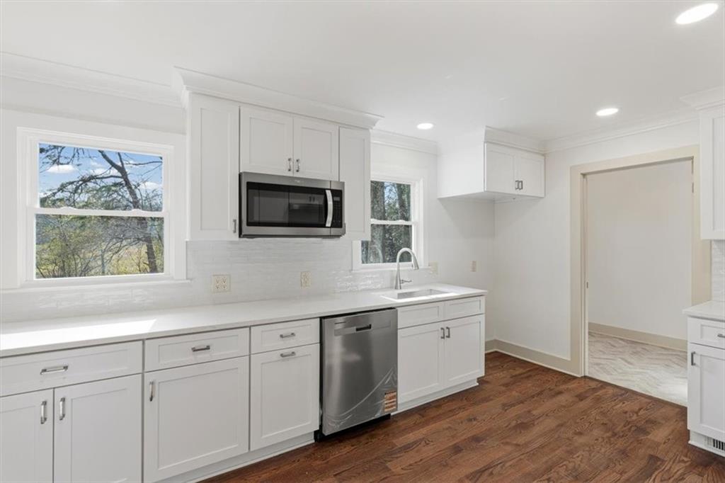 49 Apache Trail Cartersville, GA 30120 - Photo 19 of 52 a kitchen with a sink cabinets and wooden floor