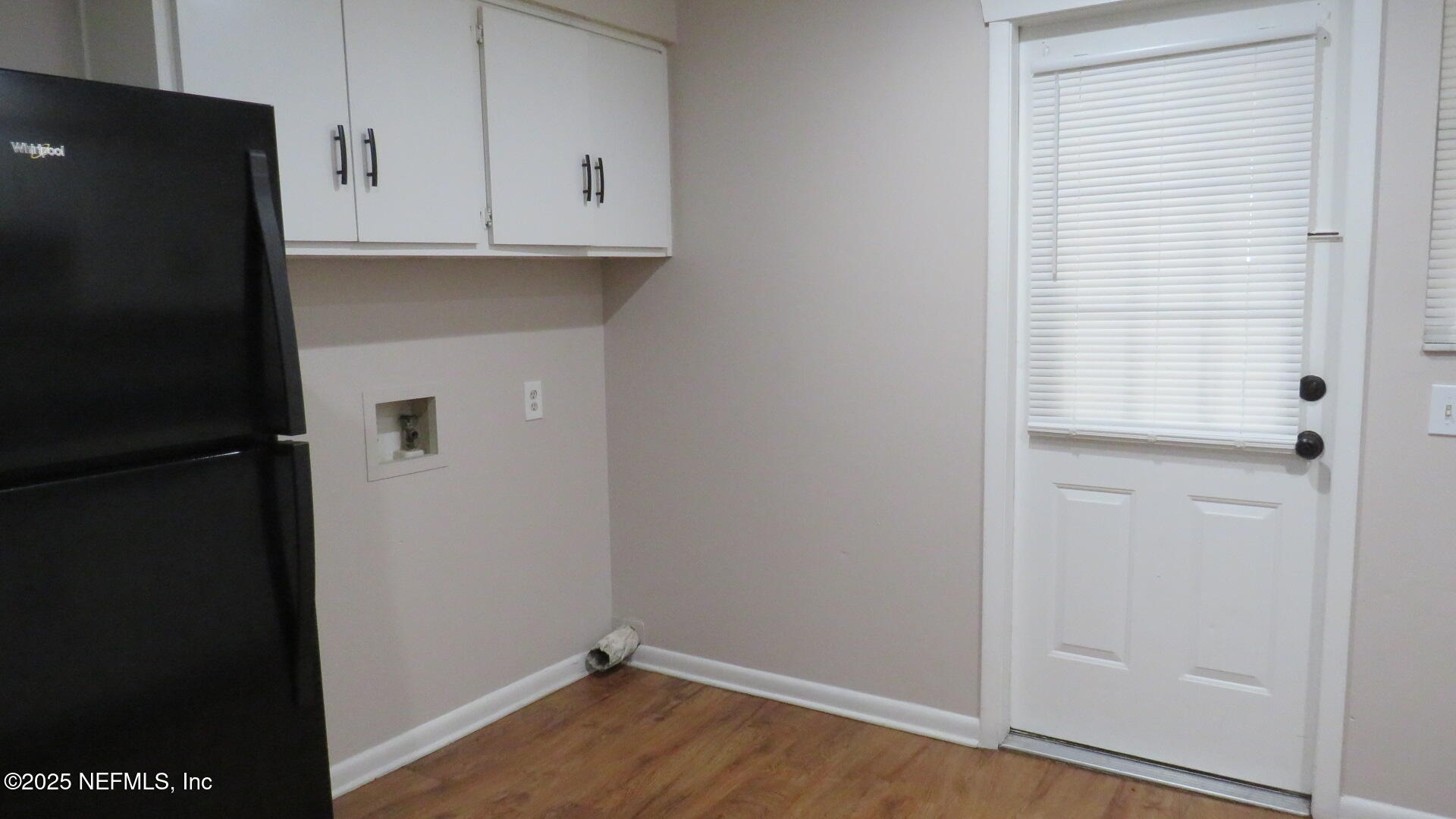 1160 Mohawk Street, Unit 2 Jacksonville, FL 32205 - Photo 4 of 9 a view of an empty room with wooden floor