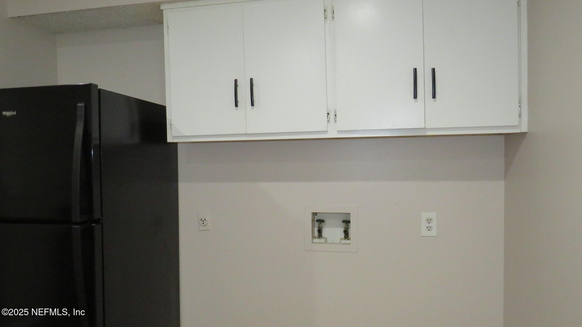 1160 Mohawk Street, Unit 2 Jacksonville, FL 32205 - Photo 5 of 9 a close view of cabinet