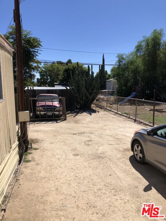 32886 Wildomar Trail Wildomar, CA 92595 - Photo 12 of 22 a view of car parked on the side of a road