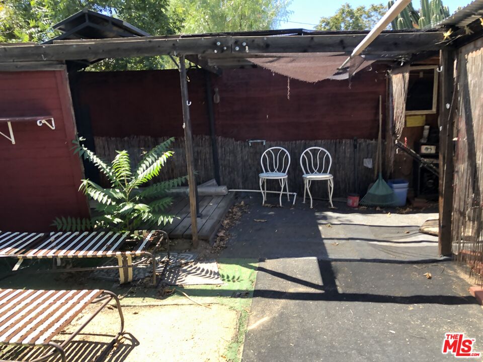 32886 Wildomar Trail Wildomar, CA 92595 - Photo 15 of 22 a front view of a house with a yard