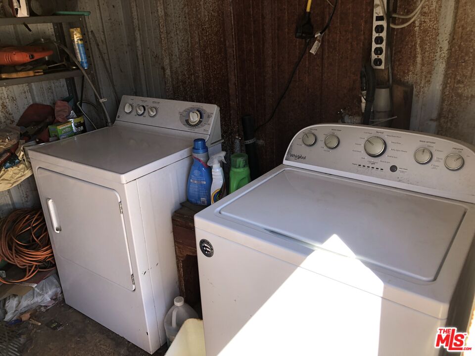 32886 Wildomar Trail Wildomar, CA 92595 - Photo 17 of 22 a utility room with dryer and washer