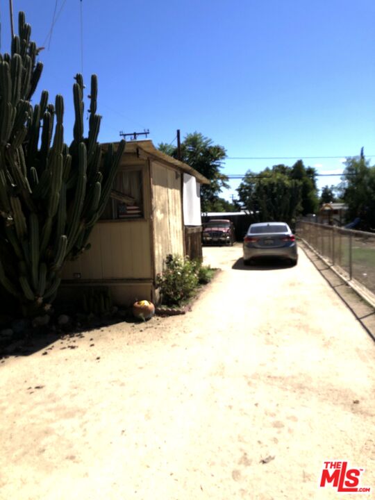 32886 Wildomar Trail Wildomar, CA 92595 - Photo 21 of 22 a view of outdoor space yard and swimming pool