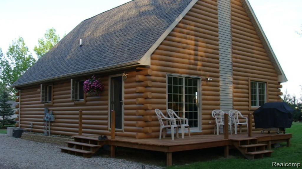 1480 South Kingston Road Deford, MI 48729 - Photo 1 of 12 Side Rear and Deck view 12.16