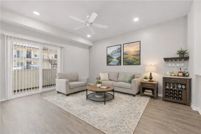 a spacious bedroom with a bed and a window