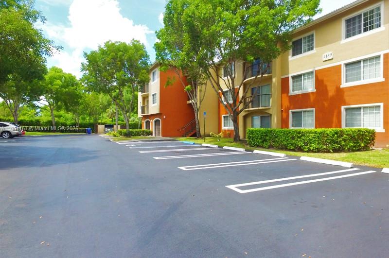 4149 Haverhill Road, Unit 1608 West Palm Beach, FL 33417 - Photo 17 of 29 a view of a building with a street