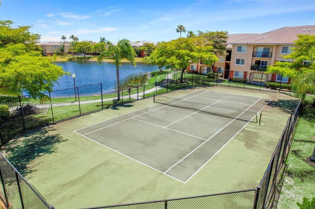 4149 Haverhill Road, Unit 1608 West Palm Beach, FL 33417 - Photo 25 of 29 a view of a tennis court