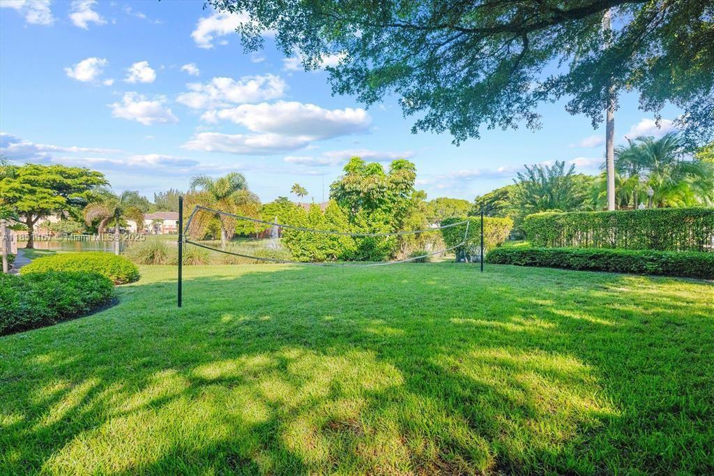 4149 Haverhill Road, Unit 1608 West Palm Beach, FL 33417 - Photo 26 of 29 a view of a garden with a building