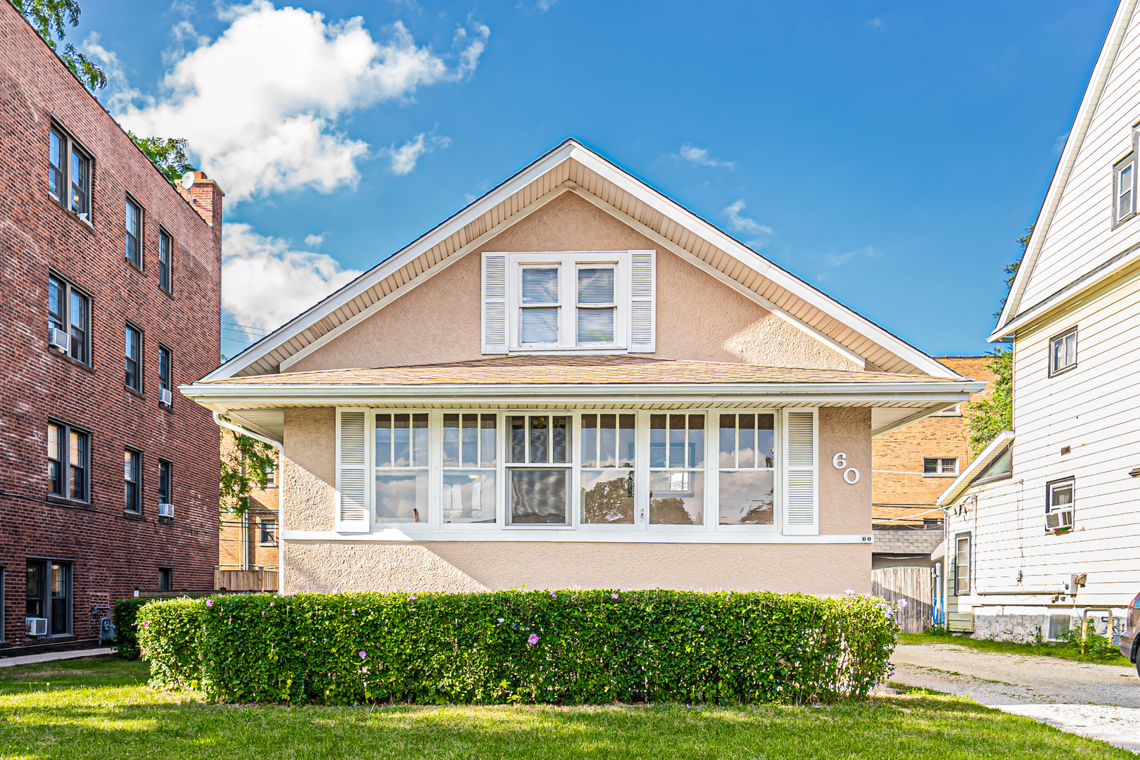 60 Pine Avenue Riverside, IL 60546 - Photo 1 of 27 a front view of a house with a yard
