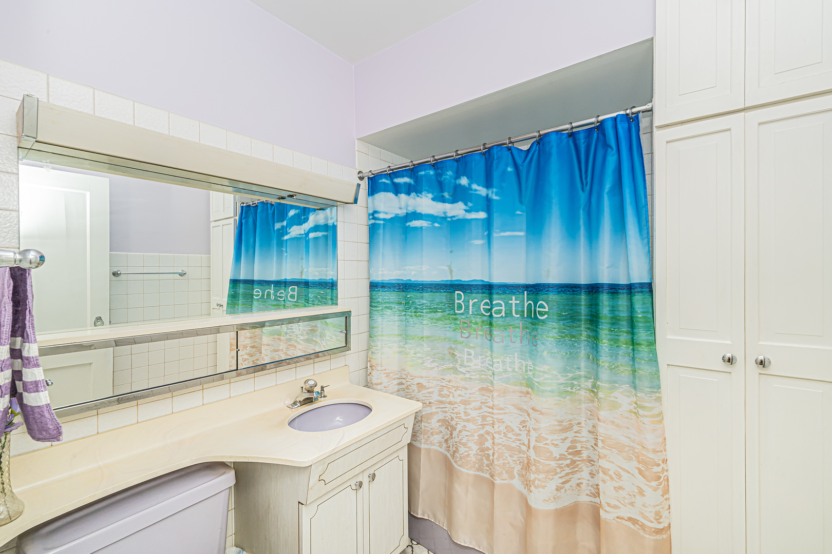 60 Pine Avenue Riverside, IL 60546 - Photo 13 of 27 a bathroom with a sink and a mirror