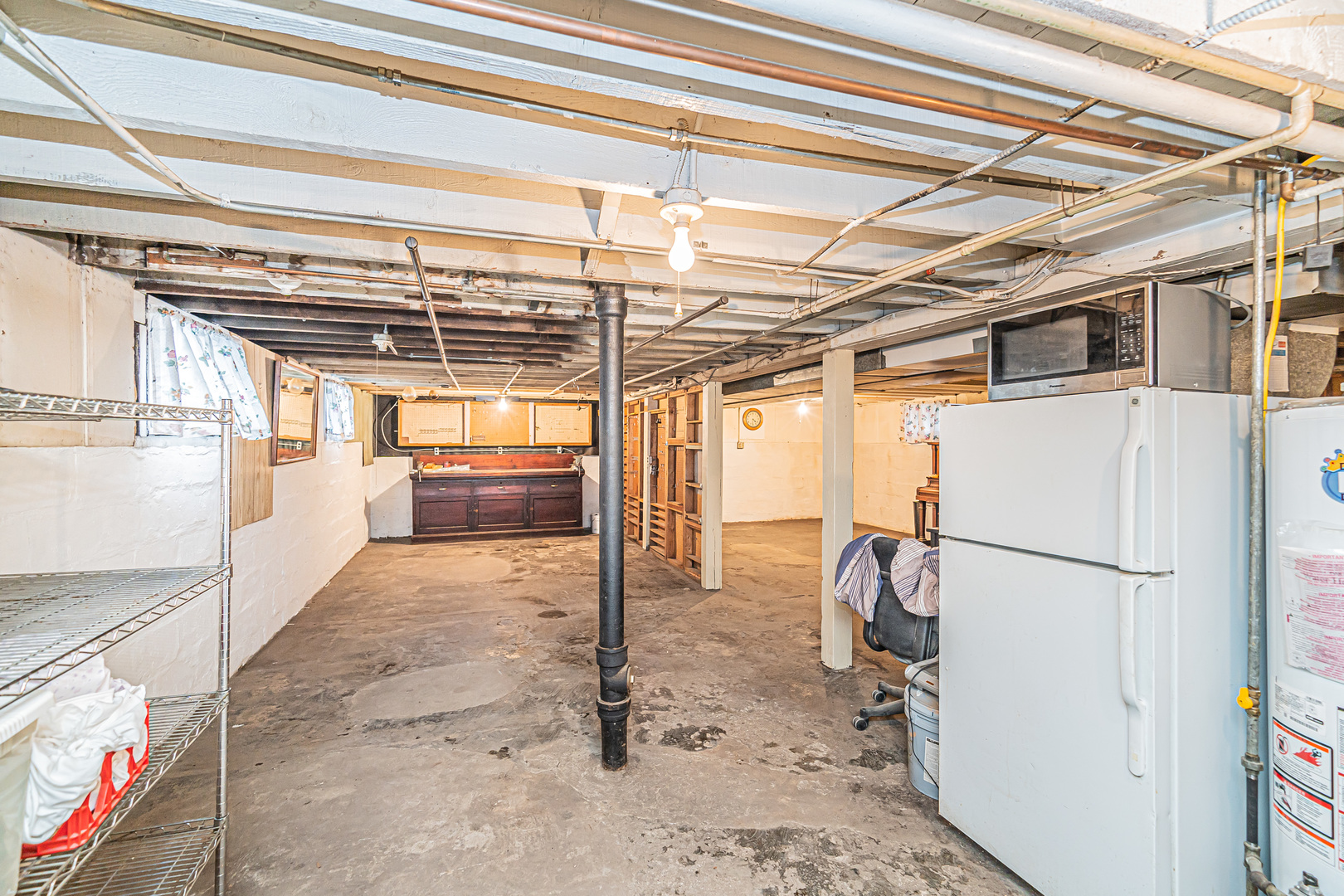 60 Pine Avenue Riverside, IL 60546 - Photo 15 of 27 a view of storage and utility room with a refrigerator