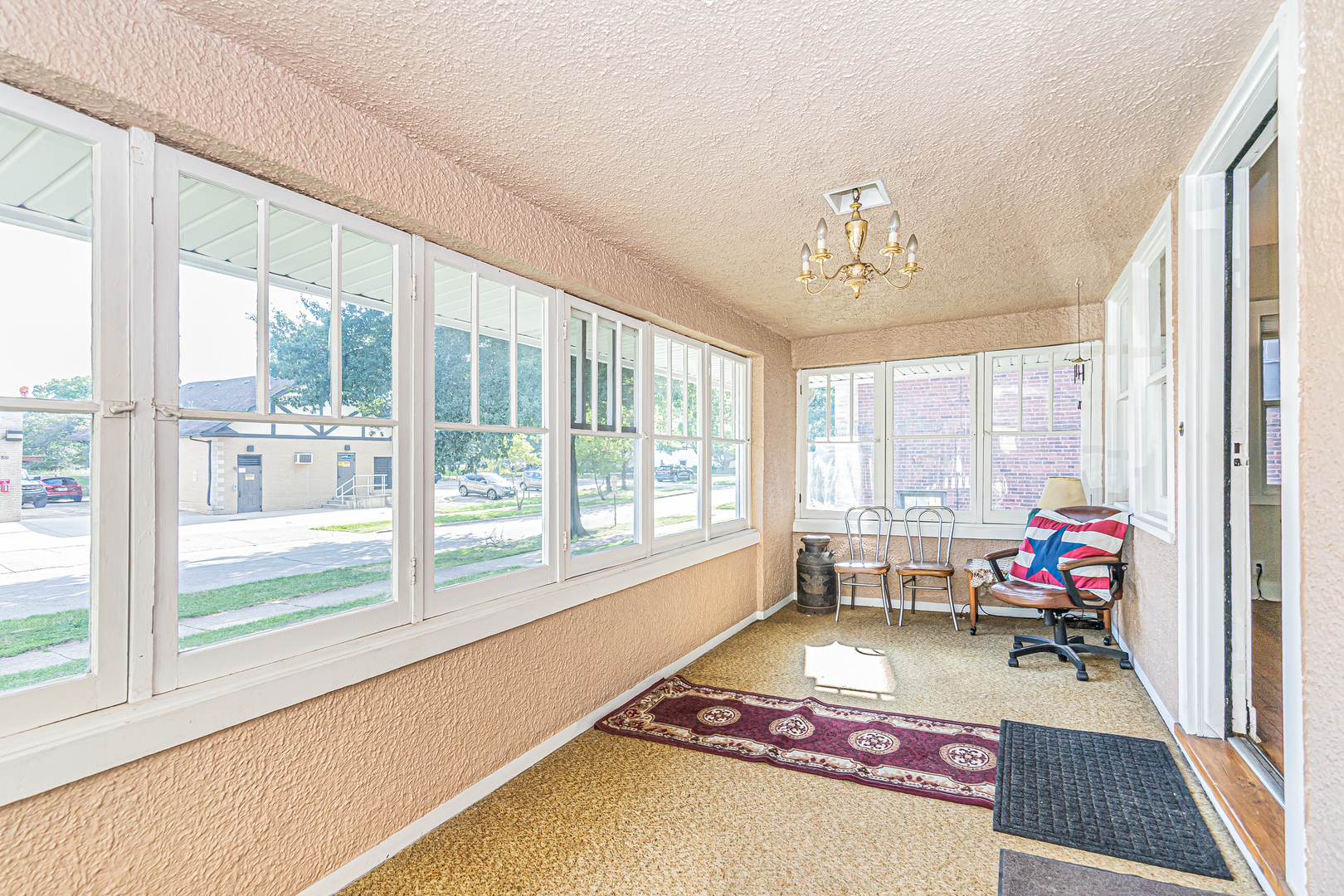 60 Pine Avenue Riverside, IL 60546 - Photo 3 of 27 a living room with furniture and a large window