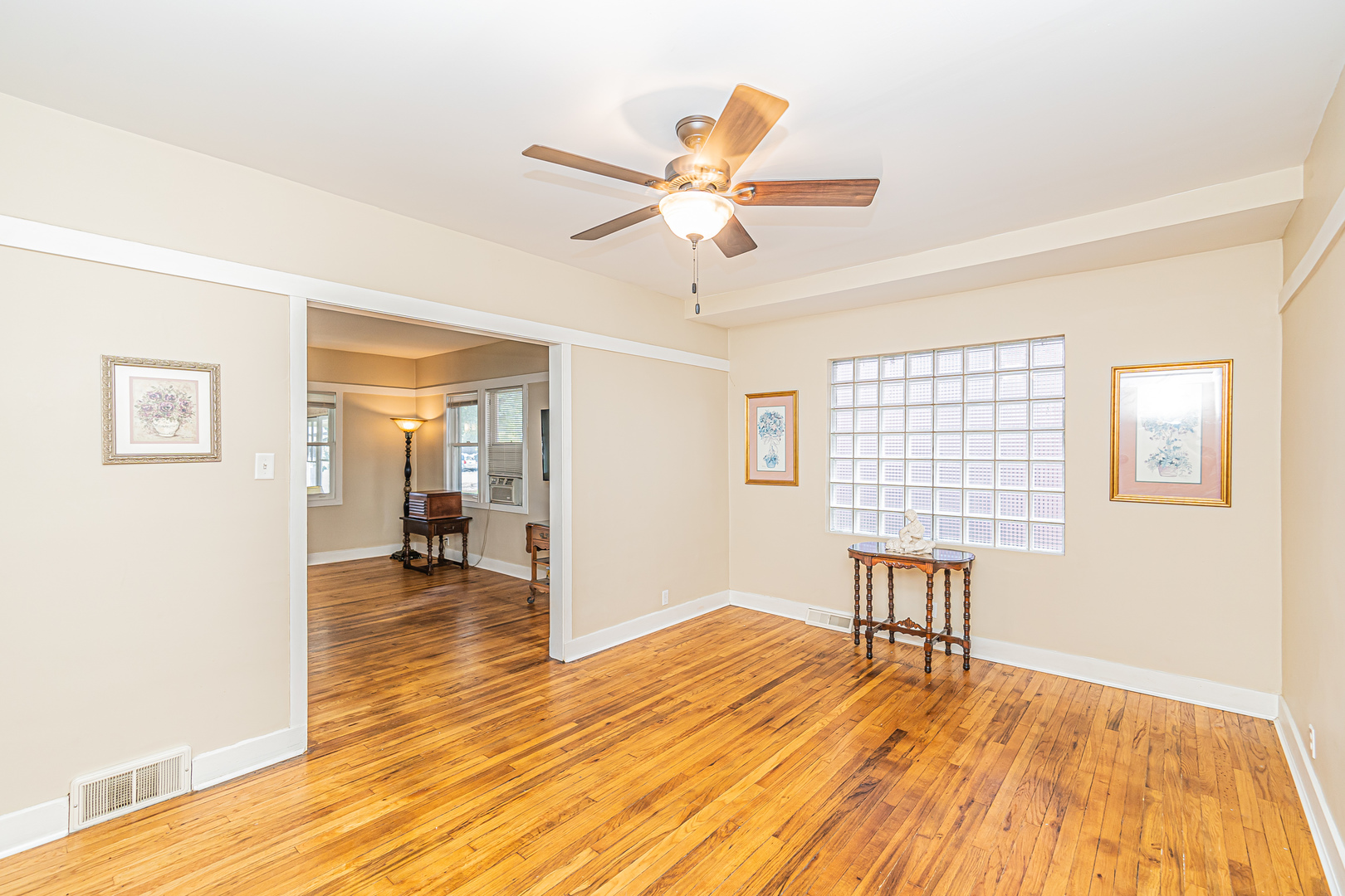 60 Pine Avenue Riverside, IL 60546 - Photo 7 of 27 a view of a livingroom with a dining table & a window