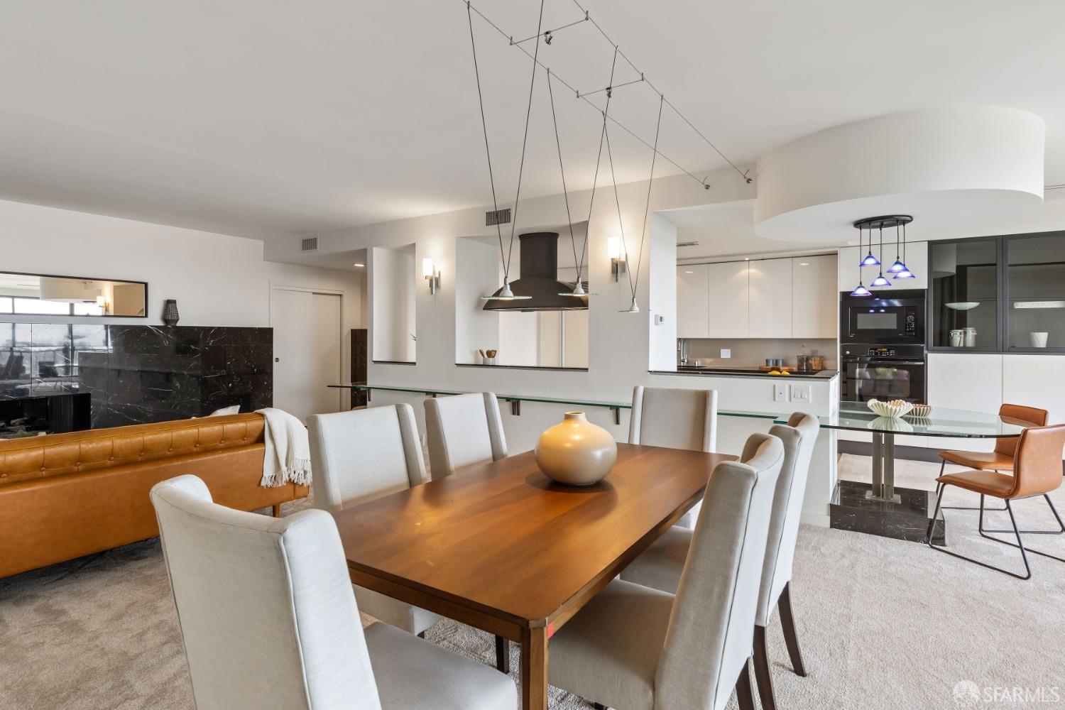 50 Mounds Road, Unit 404 San Mateo, CA 94402 - Photo 11 of 23 a view of kitchen and dining area with furniture