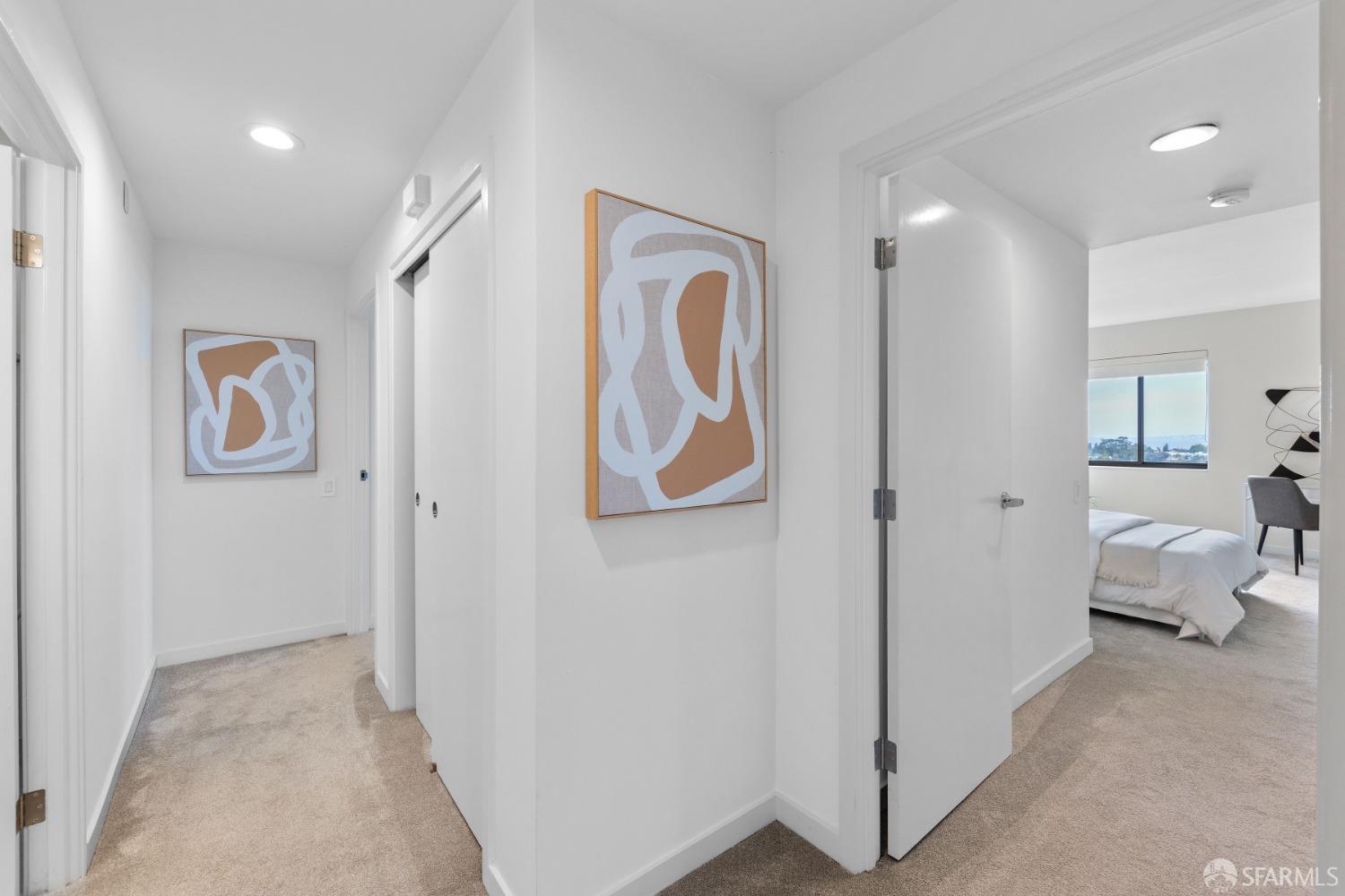 50 Mounds Road, Unit 404 San Mateo, CA 94402 - Photo 14 of 23 a view of a hallway with bathroom