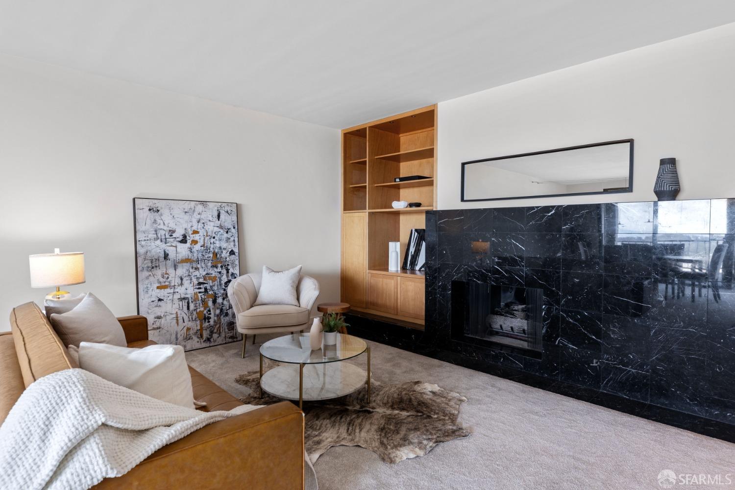 50 Mounds Road, Unit 404 San Mateo, CA 94402 - Photo 4 of 23 a living room with furniture and a lamp