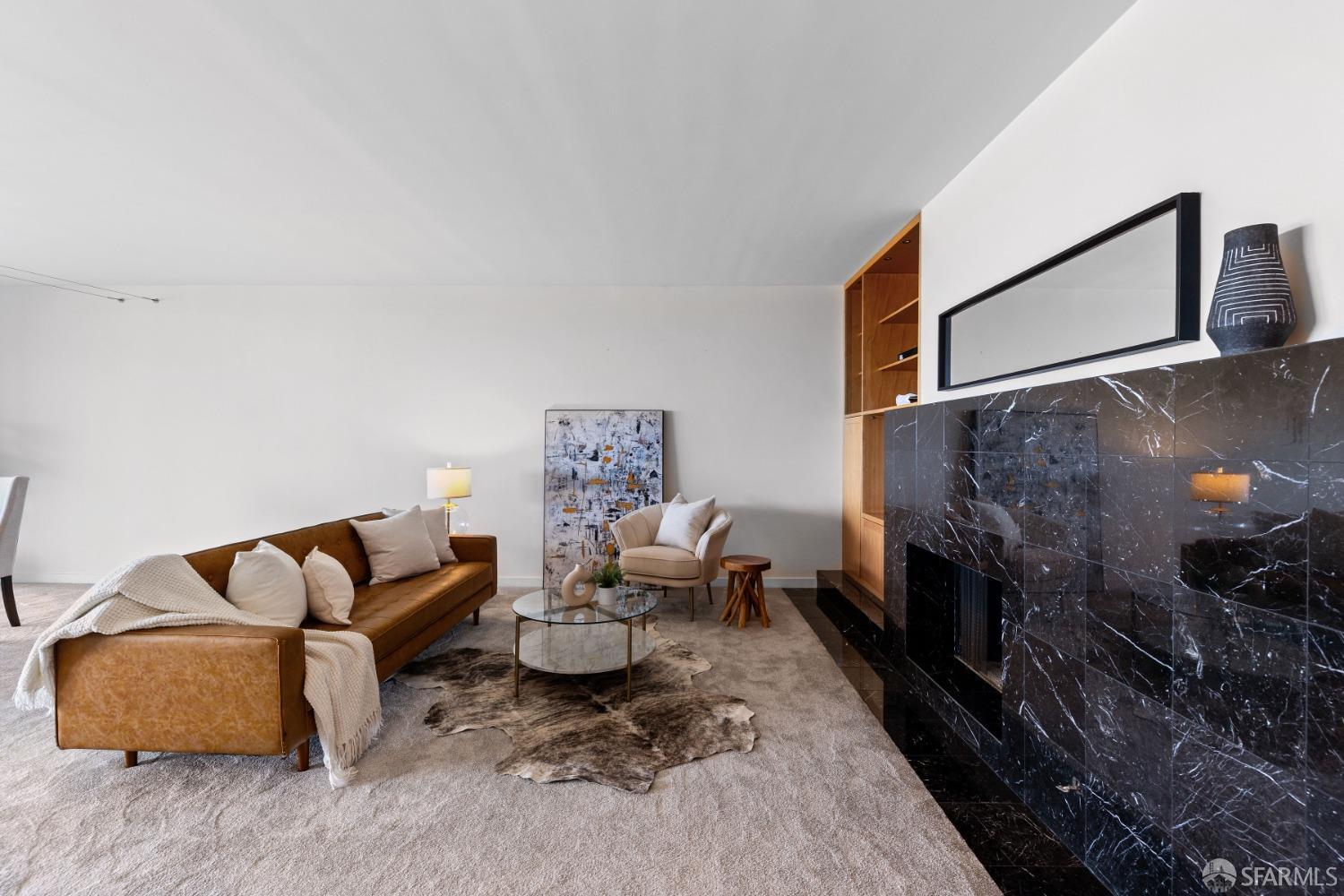 50 Mounds Road, Unit 404 San Mateo, CA 94402 - Photo 6 of 23 a living room with furniture and a couch