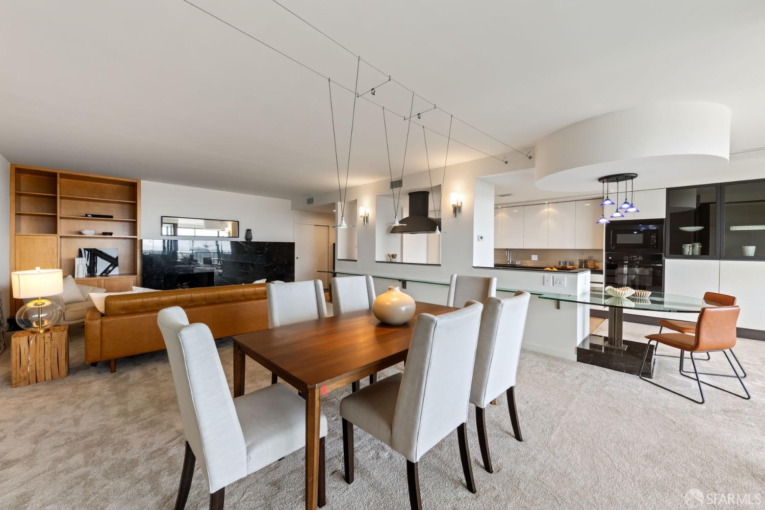 50 Mounds Road, Unit 404 San Mateo, CA 94402 - Photo 10 of 23 a dining room with furniture and kitchen view