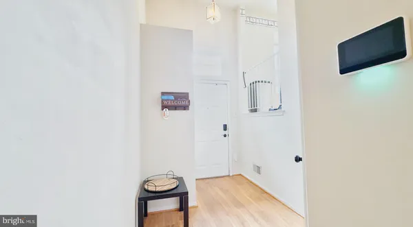 a view of livingroom with furniture and flat screen tv