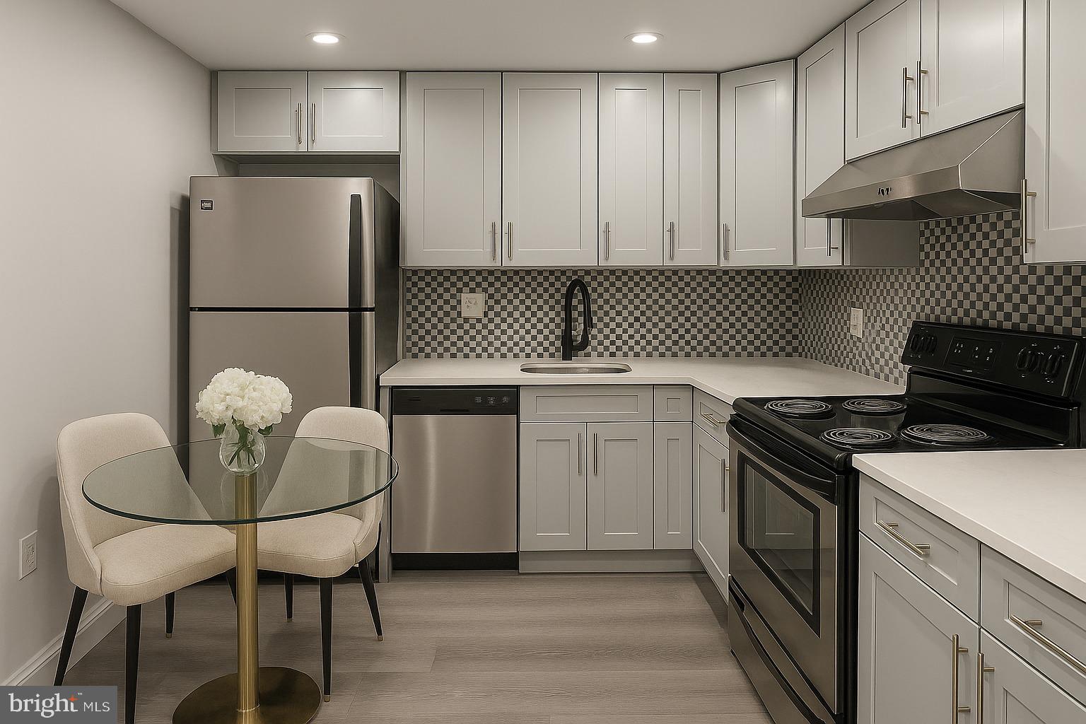 a kitchen with a white cabinets and white appliances