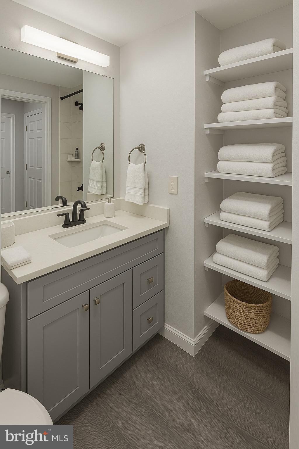 2001-00 Hamilton Street, Unit 1026 Philadelphia, PA 19130 - Photo 4 of 7 a bathroom with a sink and a mirror