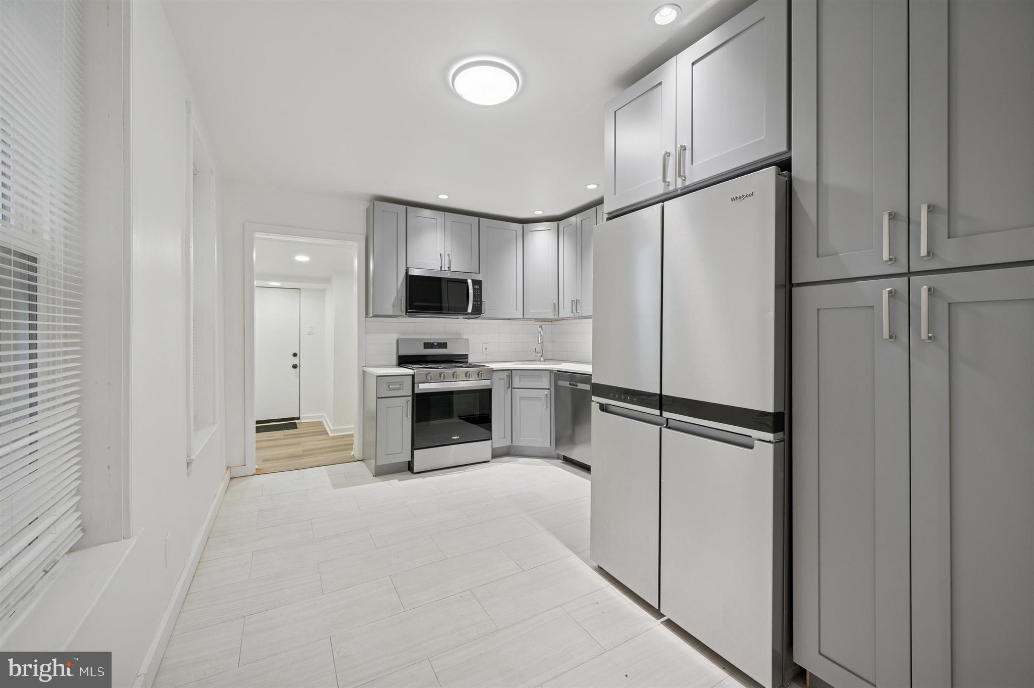 5221 Walton Avenue Philadelphia, PA 19143 - Photo 8 of 25 Updated Kitchen
