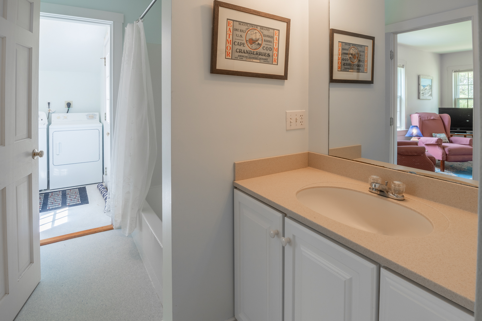 15 Swift Rock Road Nantucket, MA 02554 - Photo 19 of 32 a bathroom with a sink and a mirror
