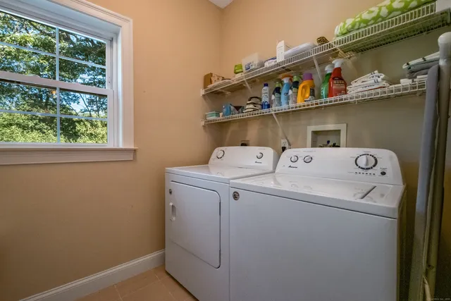 a front view of a house with glass windows