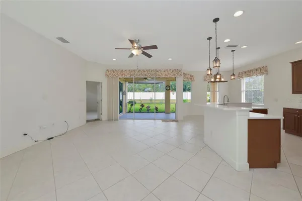 a view of a kitchen with furniture and a window