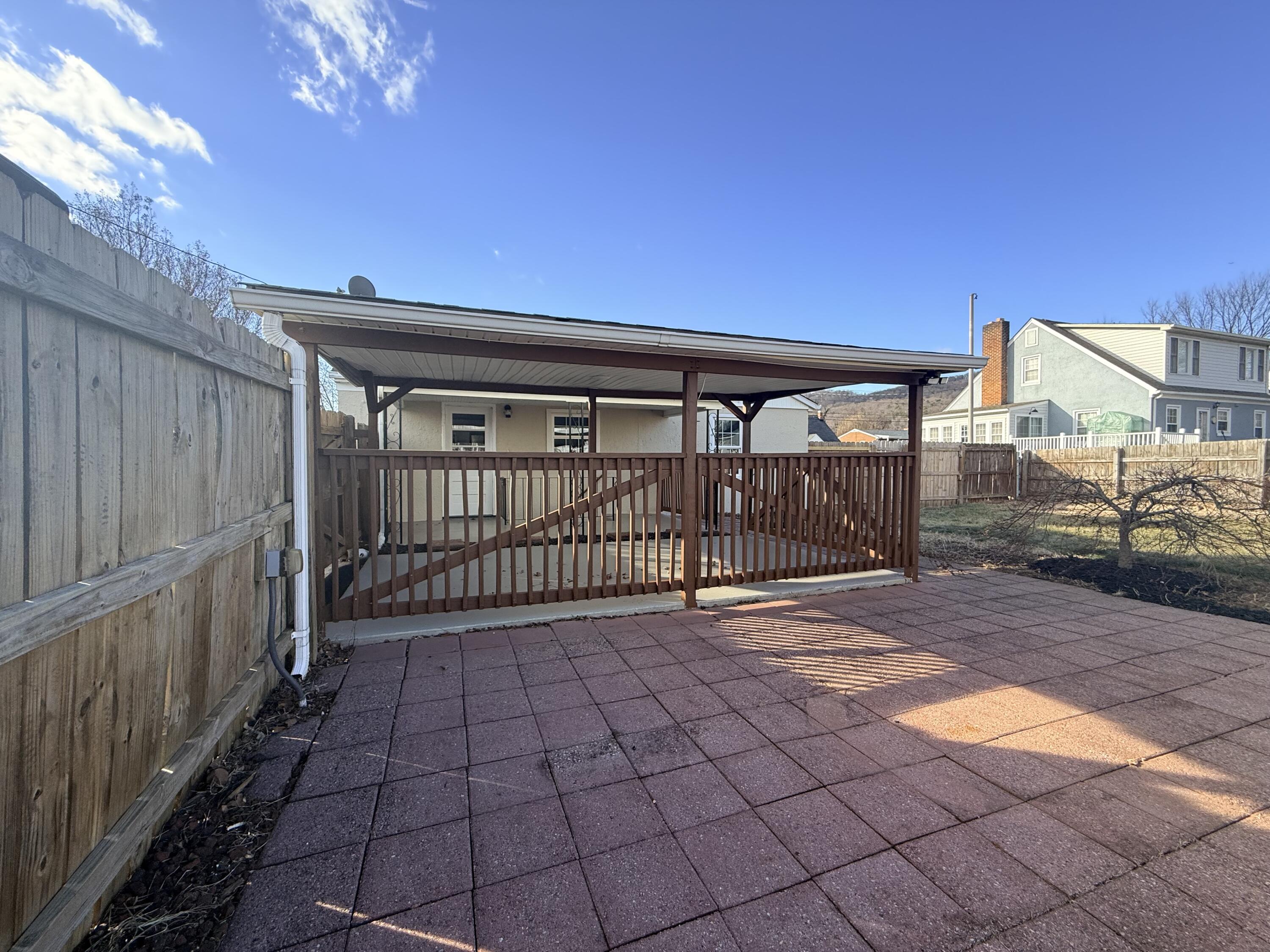 402 Goodwin Avenue Salem, VA 24153 - Photo 9 of 10 a view of a porch with a small yard
