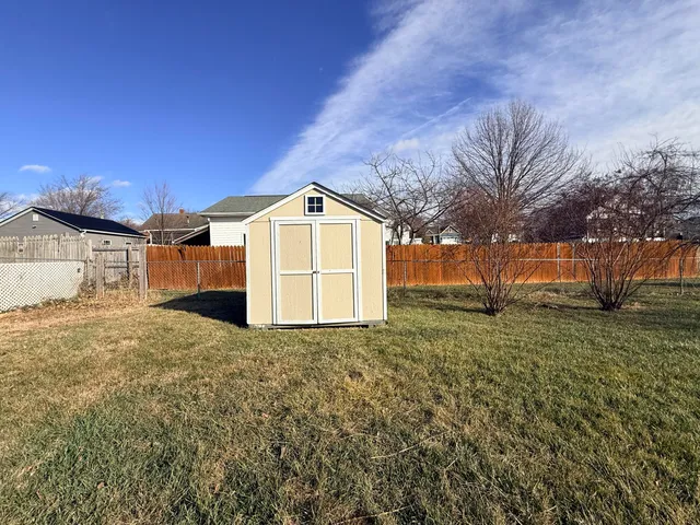 a bathroom with a sink and a yard