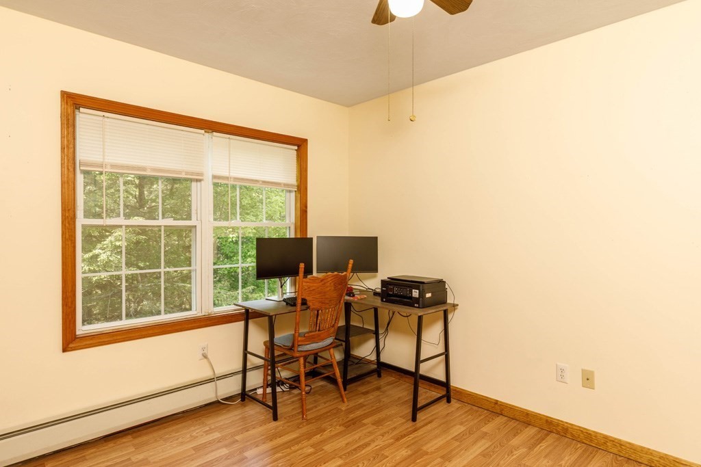 101 Holt Road Ashburnham, MA 01430 - Photo 11 of 22 a workspace with furniture and a window