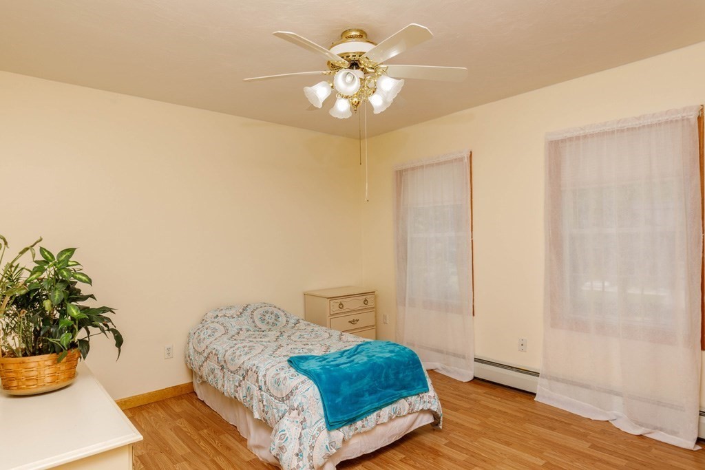 101 Holt Road Ashburnham, MA 01430 - Photo 10 of 22 a living room with furniture and a potted plant