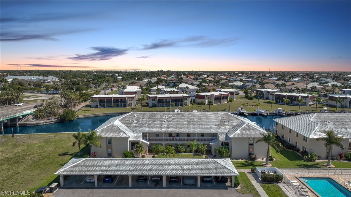 220 Coldeway Drive, Unit 112 Punta Gorda, FL 33950 - Photo 1 of 50 a aerial view of a house with a garden