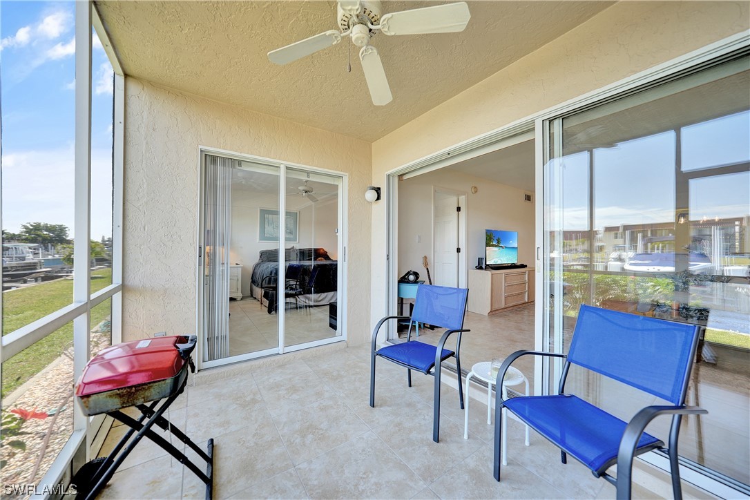220 Coldeway Drive, Unit 112 Punta Gorda, FL 33950 - Photo 30 of 50 a view of a livingroom with furniture and a window