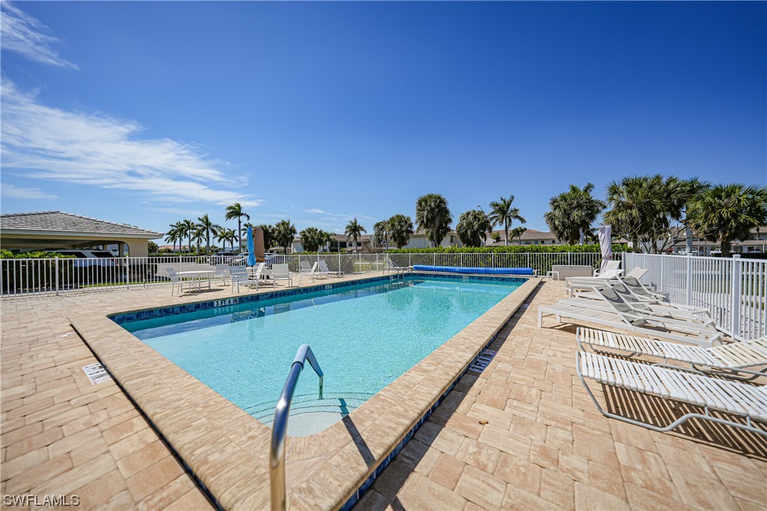 220 Coldeway Drive, Unit 112 Punta Gorda, FL 33950 - Photo 36 of 50 a view of swimming pool with outdoor seating and plants