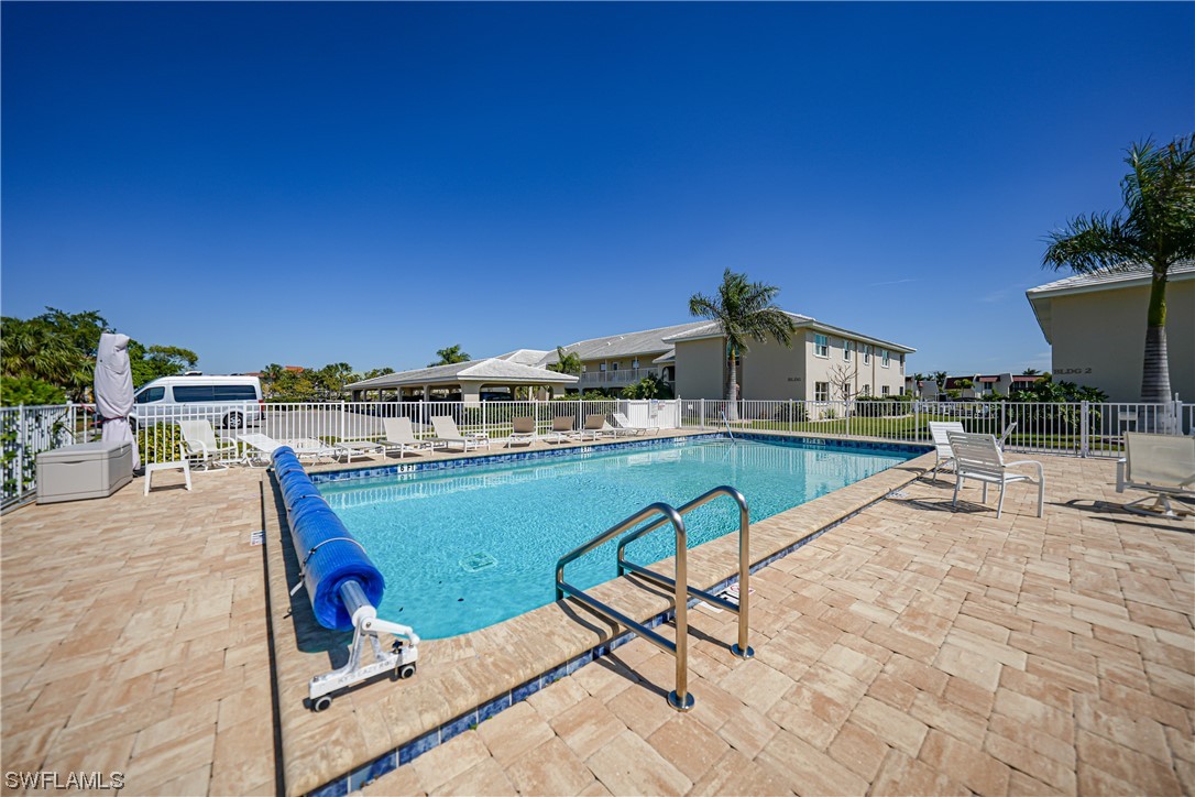 220 Coldeway Drive, Unit 112 Punta Gorda, FL 33950 - Photo 37 of 50 a view of a chairs and table on the terrace