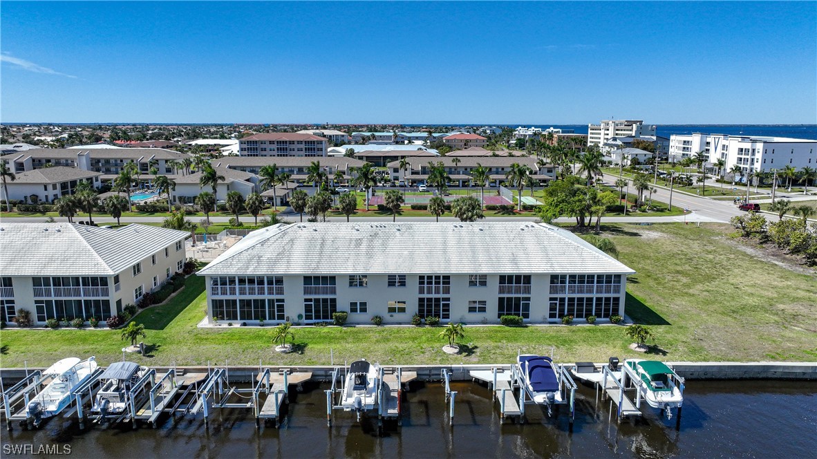 220 Coldeway Drive, Unit 112 Punta Gorda, FL 33950 - Photo 42 of 50 a view of a swimming pool and outdoor space