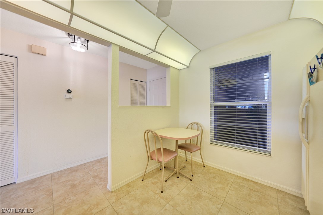 220 Coldeway Drive, Unit 112 Punta Gorda, FL 33950 - Photo 7 of 50 a view of a bathroom with a sink and mirror