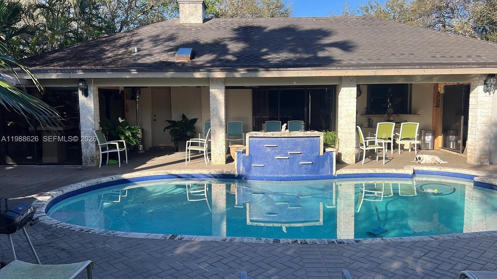 30705 Southwest 197th Avenue Homestead, FL 33030 - Photo 14 of 17 a view of house with outdoor space