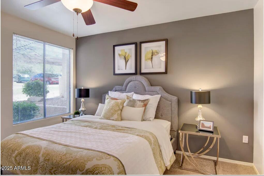 1550 East Thunderbird Road, Unit 1 Phoenix, AZ 85022 - Photo 4 of 11 a bedroom with a bed and window