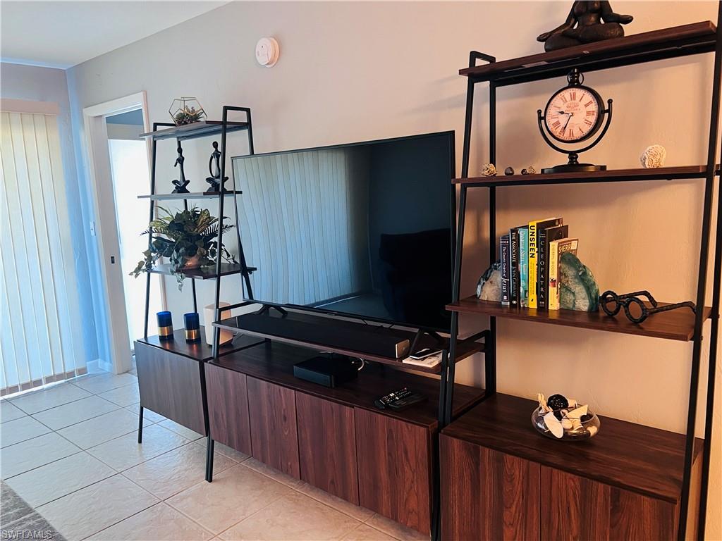 5530 Rattlesnake Hammock Road, Unit K103 Naples, FL 34112 - Photo 1 of 32 a view of entryway with a fan