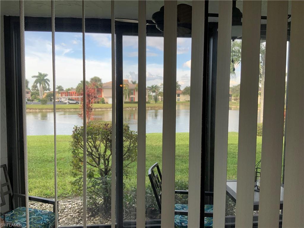 5530 Rattlesnake Hammock Road, Unit K103 Naples, FL 34112 - Photo 31 of 32 a view of a glass door and porch