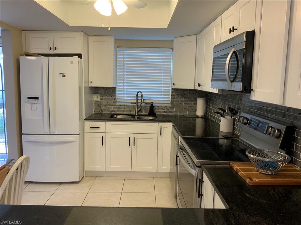 5530 Rattlesnake Hammock Road, Unit K103 Naples, FL 34112 - Photo 5 of 32